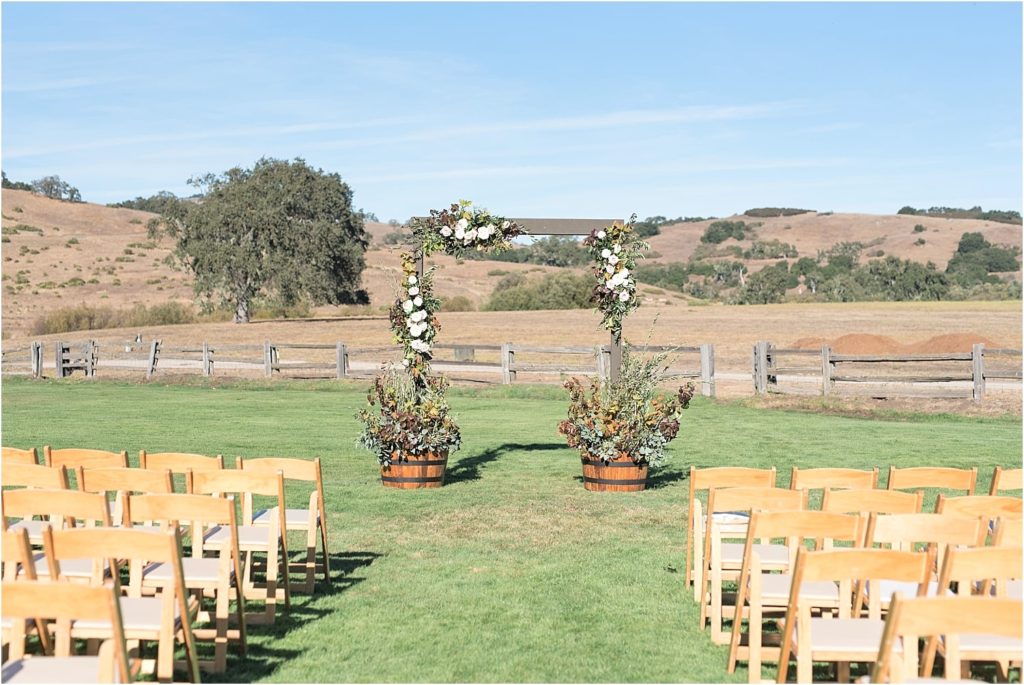 A beautiful barn Santa Lucia Preserve Wedding in Carmel Valley, California captured by Monterey Wedding Photographers Laura and Rachel Photography featured on Carats & Cake