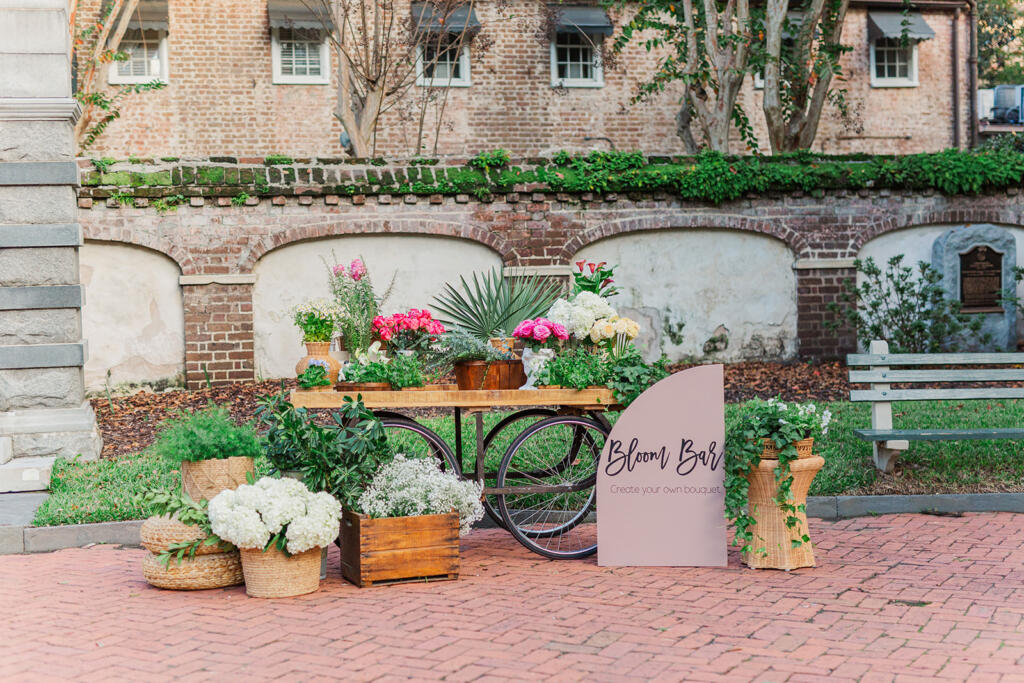 best place to propose in Charleston, flower cart proposal, Charleston flower cart, charleston floral cart, floral cart proposal, bicycle table proposal, unique proposal ideas, Charleston Premier Luxury Proposal Location, charleston proposal planner, Charleston south carolina, proposal photography, under the oaks proposal, laura and rachel photography, charleston proposal photographer, where to propose in Charleston, best places to pop the question in chs, best places to pop the question in Charleston, Best Charleston Proposal Location Ideas, Proposal Locations in Charleston SC, THE BEST PLACES TO PROPOSE AROUND CHARLESTON SOUTH CAROLINA, washington square proposal, charleston wedding Photographer, charleston engagement session, charleston engagement photographer, adorn charleston, custom champagne bottle