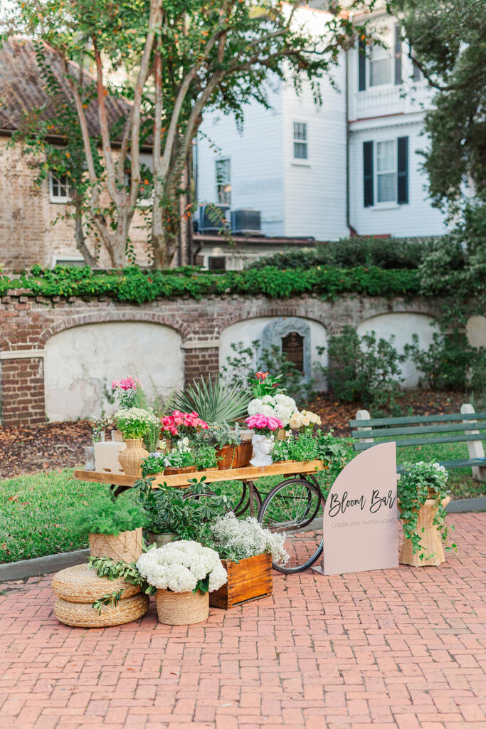 best place to propose in Charleston, flower cart proposal, Charleston flower cart, charleston floral cart, floral cart proposal, bicycle table proposal, unique proposal ideas, Charleston Premier Luxury Proposal Location, charleston proposal planner, Charleston south carolina, proposal photography, under the oaks proposal, laura and rachel photography, charleston proposal photographer, where to propose in Charleston, best places to pop the question in chs, best places to pop the question in Charleston, Best Charleston Proposal Location Ideas, Proposal Locations in Charleston SC, THE BEST PLACES TO PROPOSE AROUND CHARLESTON SOUTH CAROLINA, washington square proposal, charleston wedding Photographer, charleston engagement session, charleston engagement photographer, adorn charleston, custom champagne bottle