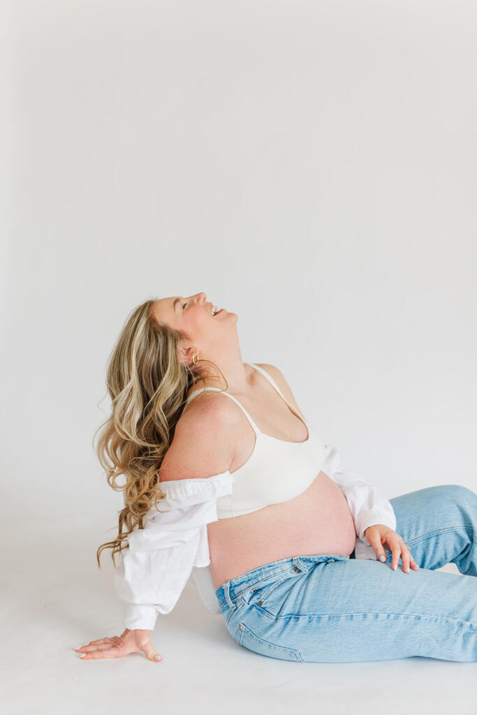 Charleston studio maternity photography featuring soft natural light and neutral styling | Laura and Rachel Photography