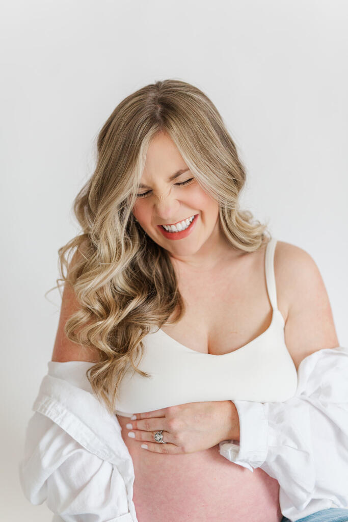 Charleston studio maternity photography featuring soft natural light and neutral styling | Laura and Rachel Photography