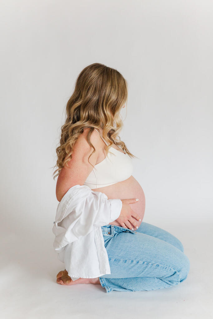 Charleston studio maternity photography featuring soft natural light and neutral styling | Laura and Rachel Photography