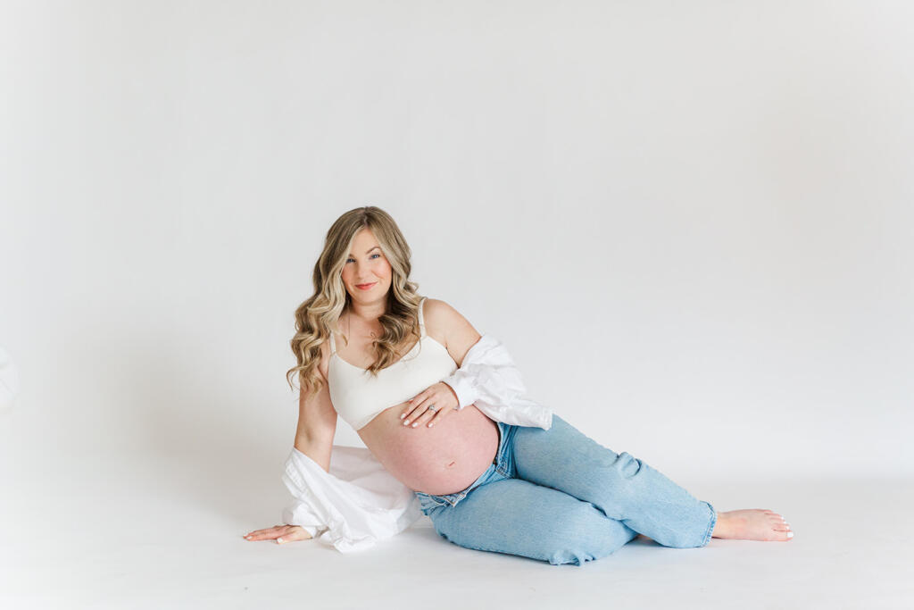 Charleston studio maternity photography featuring soft natural light and neutral styling | Laura and Rachel Photography