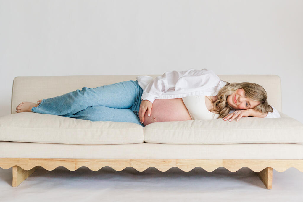 Charleston studio maternity photography featuring soft natural light and neutral styling | Laura and Rachel Photography