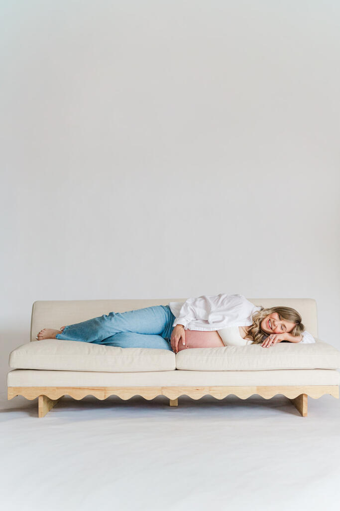 Charleston studio maternity photography featuring soft natural light and neutral styling | Laura and Rachel Photography