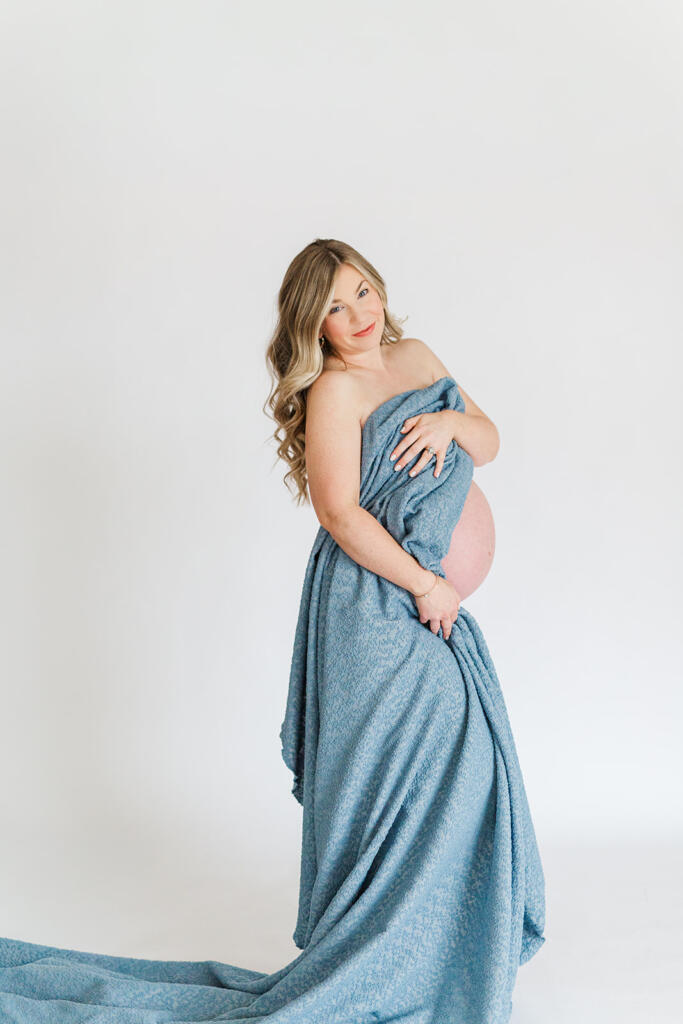 Charleston studio maternity photography featuring soft natural light and neutral styling | Laura and Rachel Photography