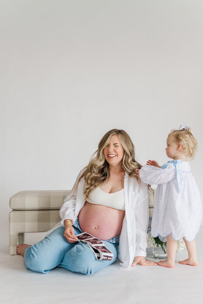 Charleston studio maternity photography featuring soft natural light and neutral styling | Laura and Rachel Photography