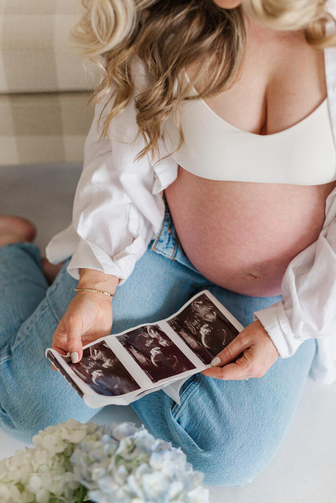 Charleston studio maternity photography featuring soft natural light and neutral styling | Laura and Rachel Photography