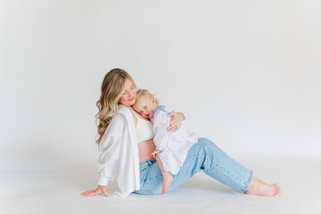 Charleston studio maternity photography featuring soft natural light and neutral styling | Laura and Rachel Photography