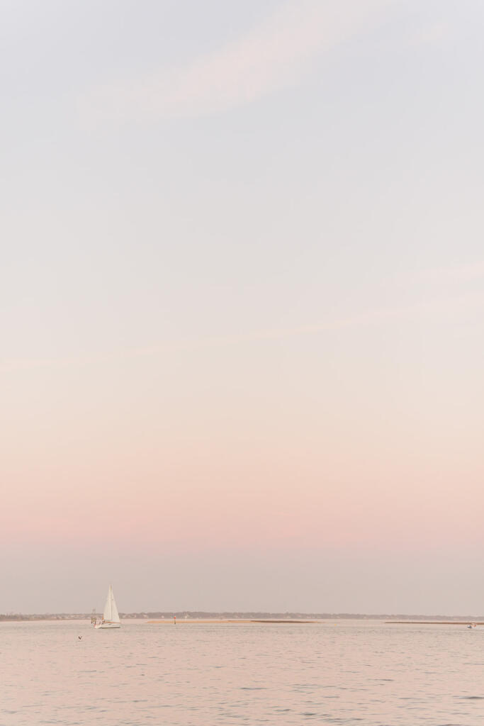 Sunset view over downtown Charleston from a rooftop bar, Romantic candlelit dinner at a Charleston restaurant, Outdoor courtyard dining in downtown Charleston, Champagne toast after a proposal in Charleston SC, Engagement celebration dinner in downtown Charleston, Girls’ weekend brunch in Charleston South Carolina, Charleston proposal photographer, Charleston engagement photographer, Charleston wedding photographer, Laura and Rachel Photography,