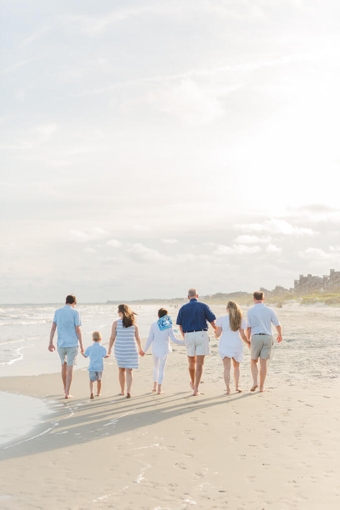 Kiawah Island For families looking for a more secluded and refined coastal backdrop, Kiawah Island is stunning. With wide, uncrowded beaches, maritime forests, winding boardwalks, and soft dune grass, it offers a peaceful setting that feels private and elevated. Kiawah Island family portraits are especially beautiful at sunset when the sky opens up over the Atlantic and the beach feels almost untouched. It’s ideal for families staying at The Sanctuary or vacationing on the island who want a relaxed, barefoot session with a polished feel.